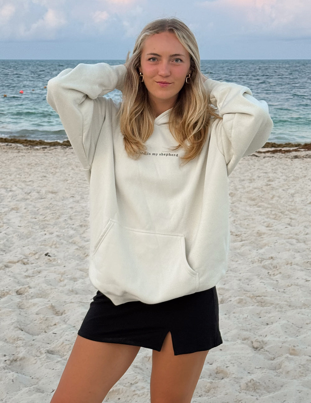 Elevated Faith Christian Hoodie in Cream with Front Pocket, ideal for casual beach outings
