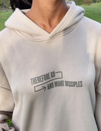 Elevated Faith Christian Hoodie in beige with 'Therefore Go and Make Disciples' graphic design