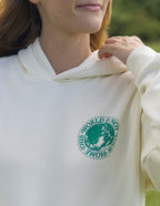 Elevated Faith Christian Hoodie in Cream featuring a globe graphic and inspirational text