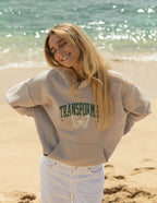 Elevated Faith Christian Hoodie in light beige with butterfly print and 'TRANSFORMED' text