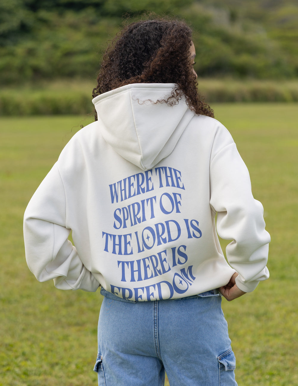 Elevated Faith Christian Hoodie with a white design featuring a freedom quote on the back