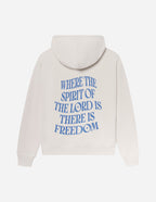 Elevated Faith Christian Hoodie in cream featuring bold text 'Where the Spirit of the Lord is There is Freedom'