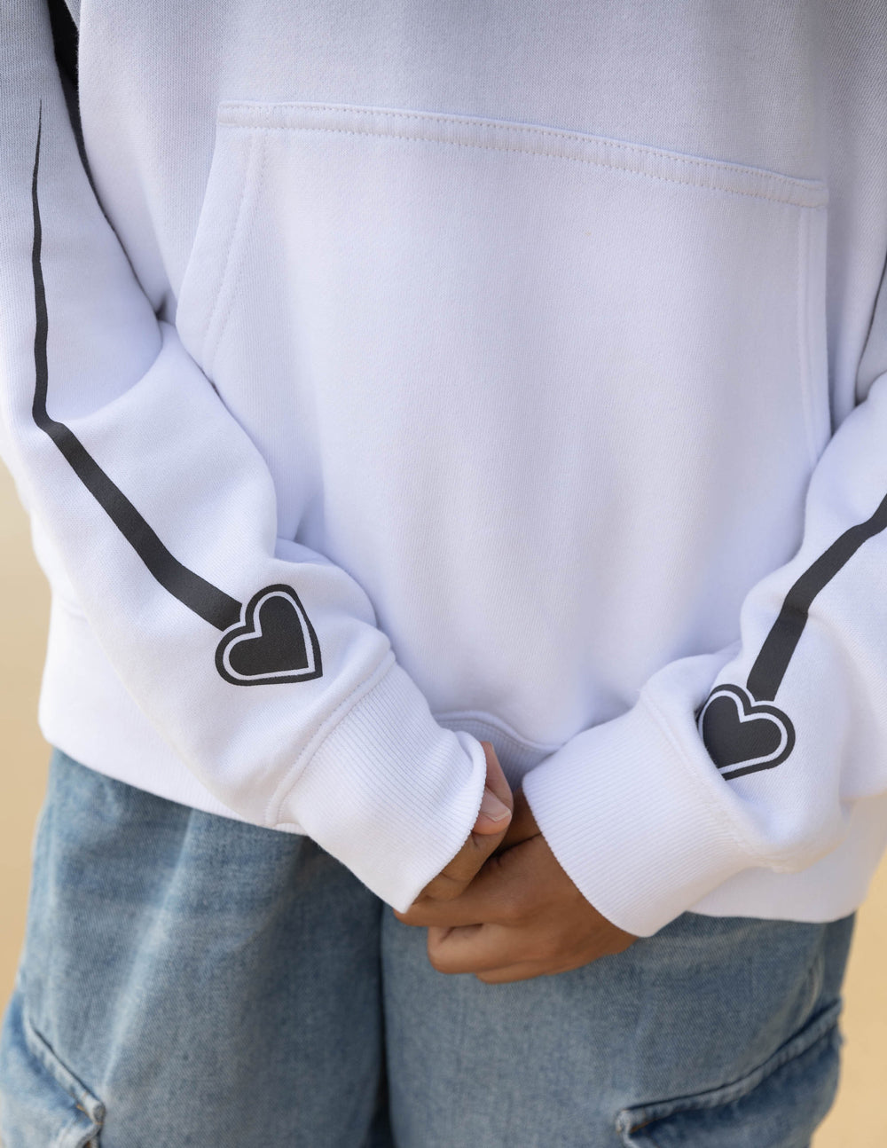 White Christian Hoodie with Heart Graphics on Sleeves for Comfortable Everyday Wear