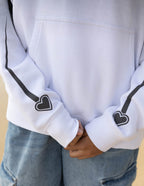 White Christian Hoodie with Heart Graphics on Sleeves for Comfortable Everyday Wear