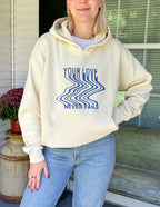 Elevated Faith Christian Hoodie in cream with a stylish design stating Your Love Never Fails