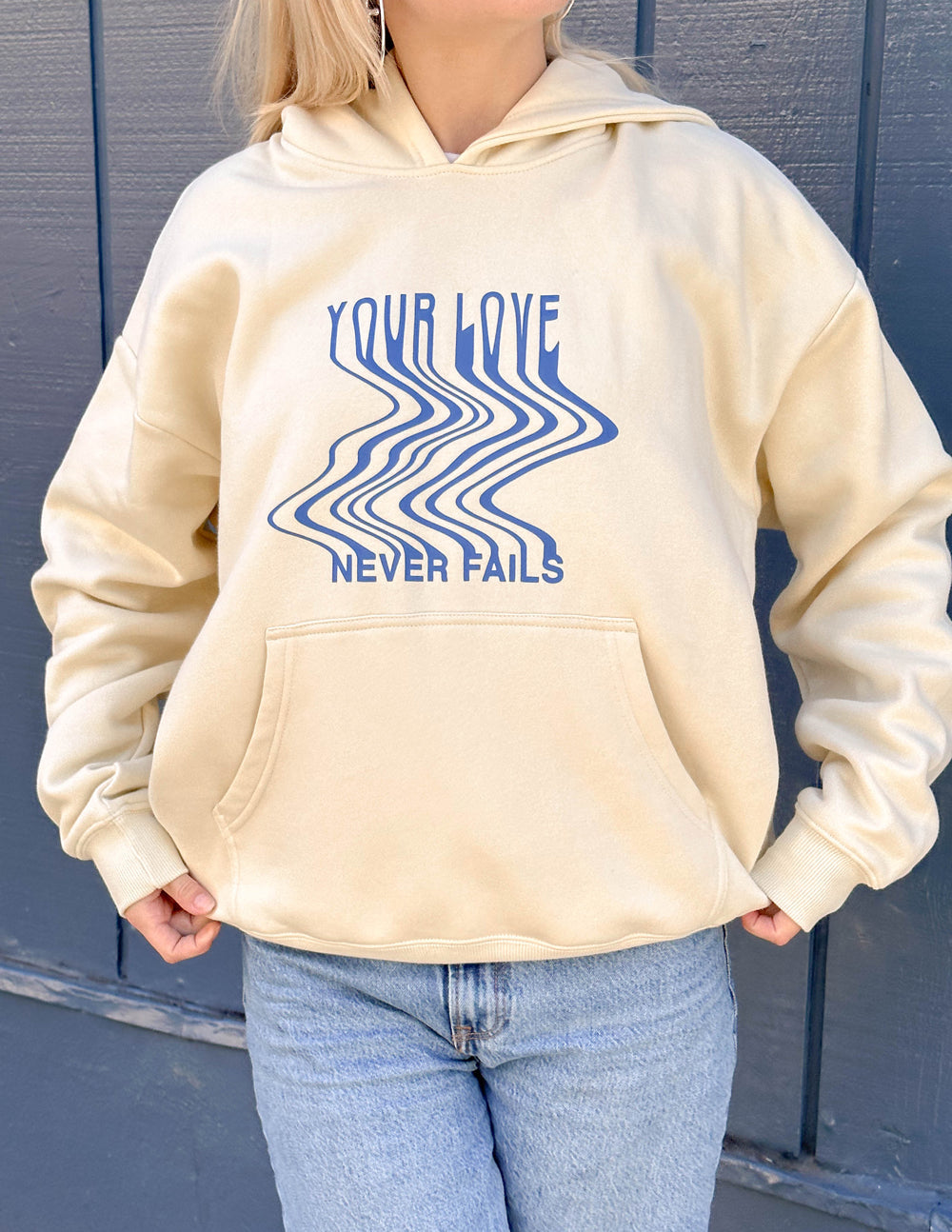 Elevated Faith Christian Hoodie featuring a stylish design with the phrase Your Love Never Fails