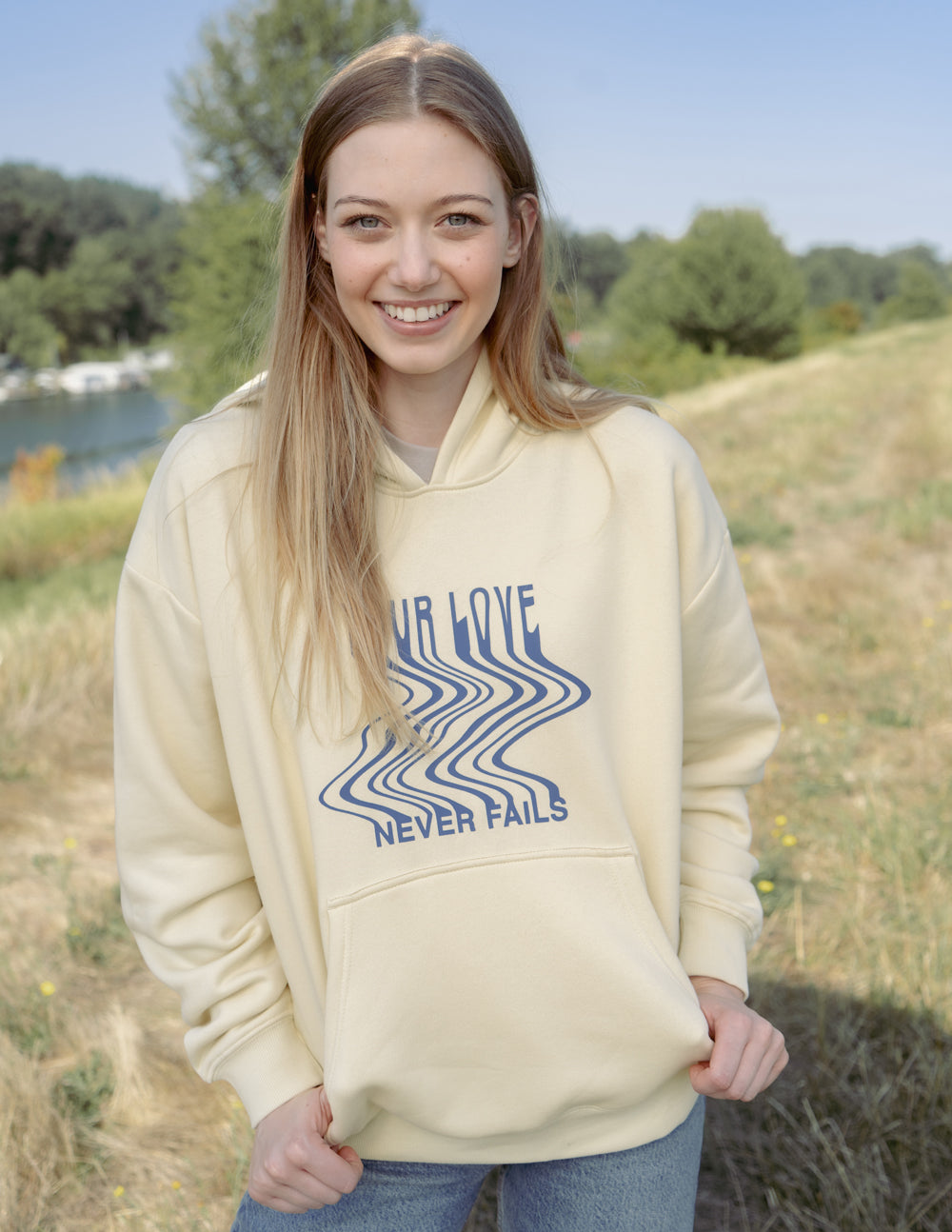 Elevated Faith Christian Hoodie in Yellow with 'Your Love Never Fails' Design for Comfort and Style