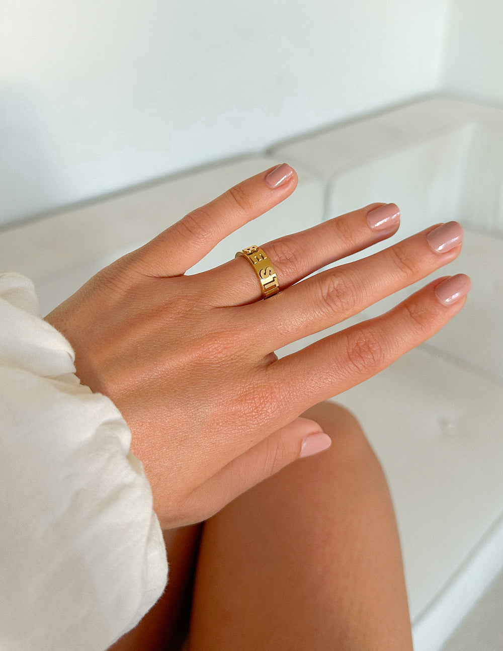 Elevated Faith Christian Jewelry Gold Ring on Model's Hand with Elegant Design