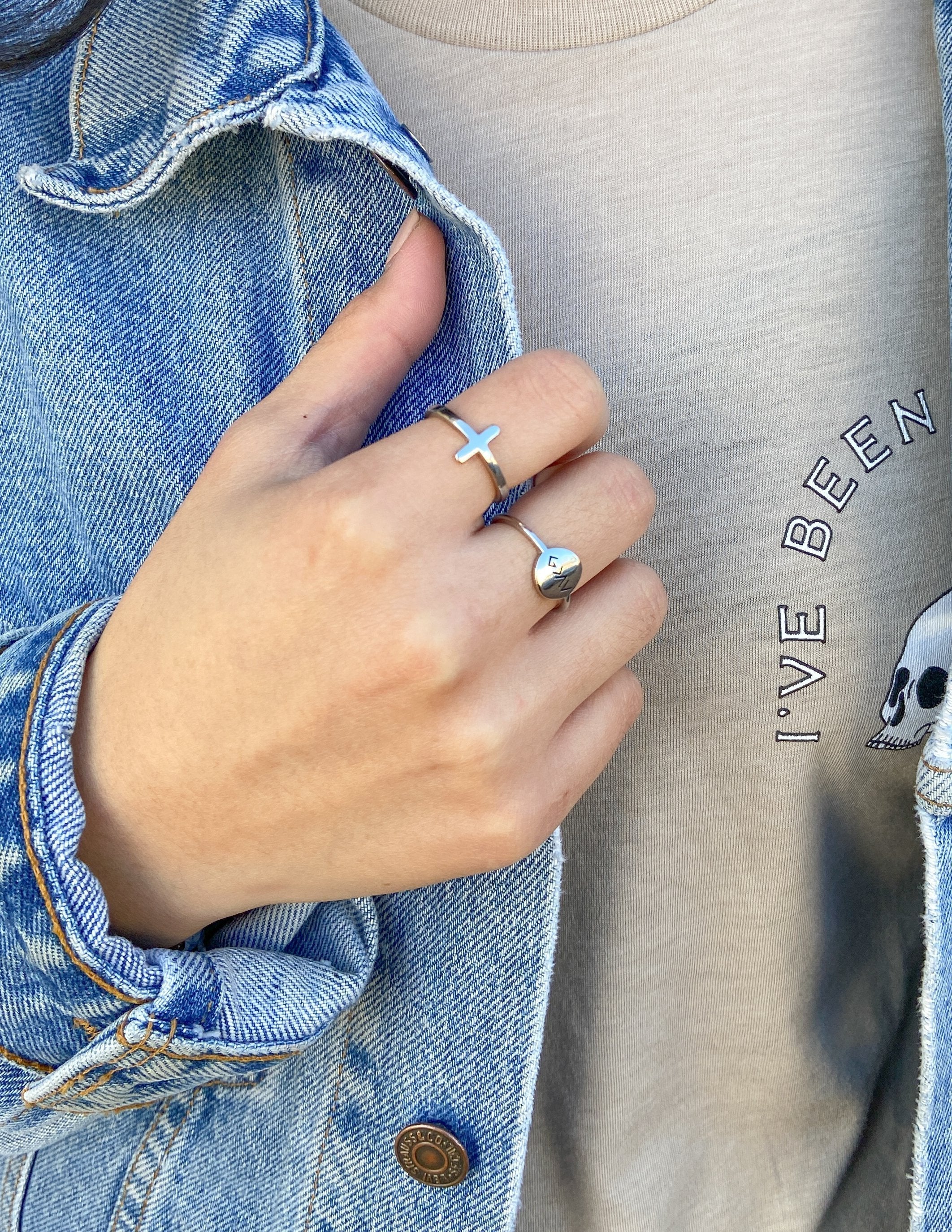 Elevated Faith Christian Jewelry Silver Cross and Heart Ring Set Worn on Hand with Denim Jacket
