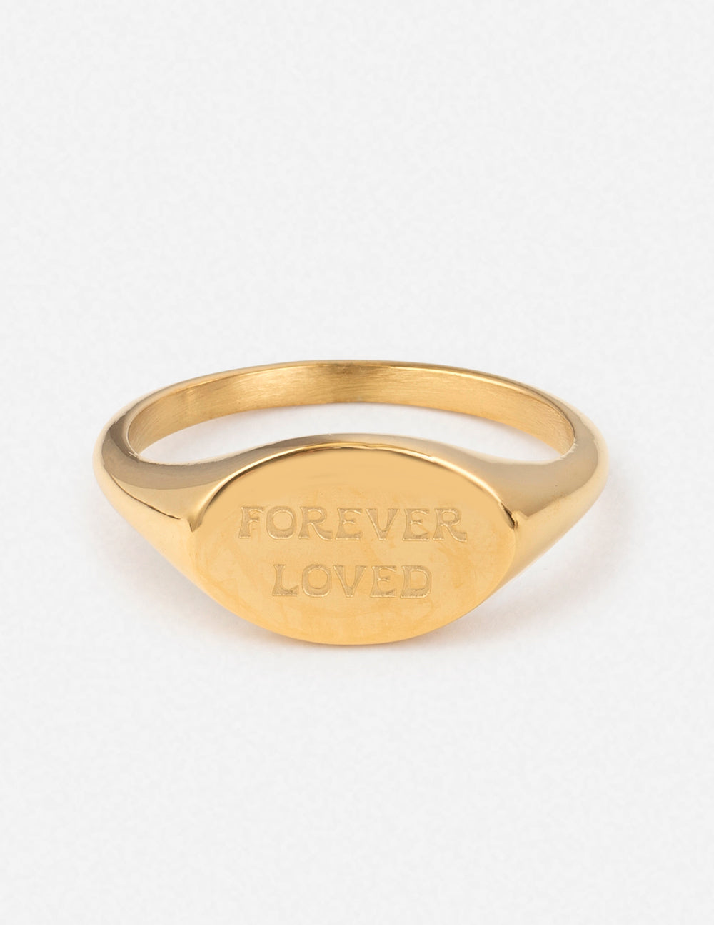Gold ring engraved with 'FOREVER LOVED' from Elevated Faith, ideal Christian Jewelry piece