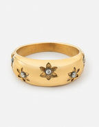 Elegant gold ring with flower design and gemstones, perfect for Christian Jewelry enthusiasts
