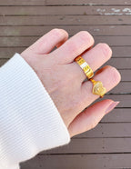 Gold Elevated Faith Christian Jewelry Ring featuring a floral design and engraved letters