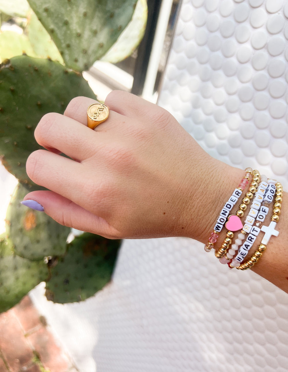 Elevated Faith Christian Jewelry Gold Ring Featured with Colorful Inspirational Bracelets