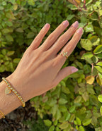 Elevated Faith Gold Cross Ring on Hand as Stylish Christian Jewelry with Adjustable Fit