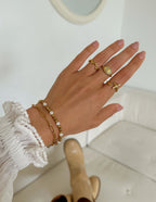 Elegant Elevated Faith Christian Jewelry Ring with Unique Design on a Hand Wearing Stylish Accessories