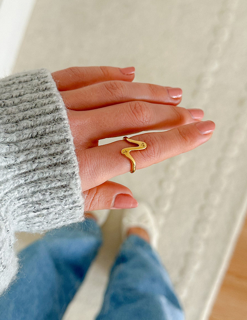Gold snake-shaped ring from Elevated Faith, perfect for stylish Christian jewelry enthusiasts
