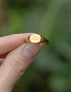 Gold ring by Elevated Faith engraved with 'He is Risen', a stylish piece of Christian Jewelry