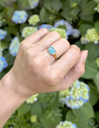 Hand wearing Elevated Faith ring featuring vibrant design, perfect for Christian Jewelry enthusiasts