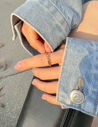 Elevated Faith Christian Jewelry Ring Worn on Hand with Denim Jacket for Faith-Inspired Style