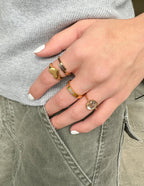 Set of rings featuring a heart design and a stone, ideal for Christian jewelry enthusiasts