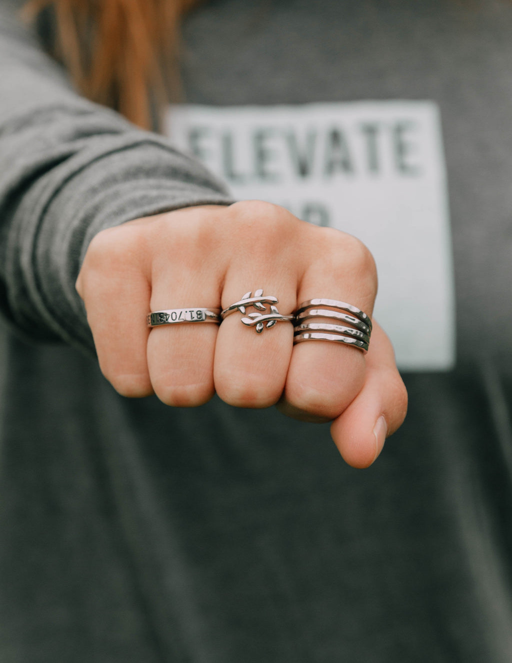 Elevated Faith Christian Jewelry ring stack featuring unique designs and a polished finish
