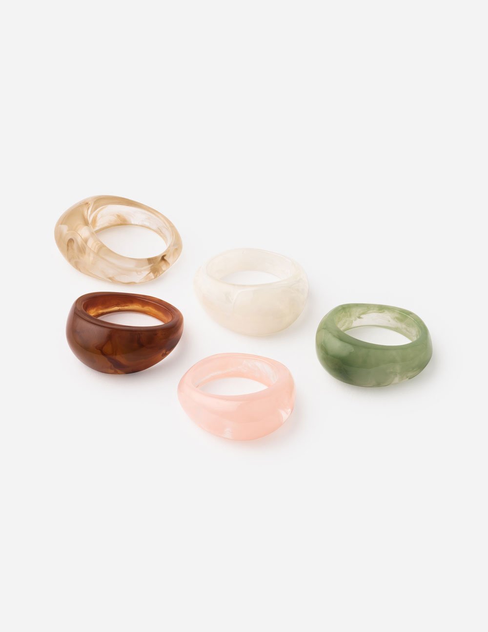 Set of five Elevated Faith rings in various colors perfect for Christian jewelry enthusiasts