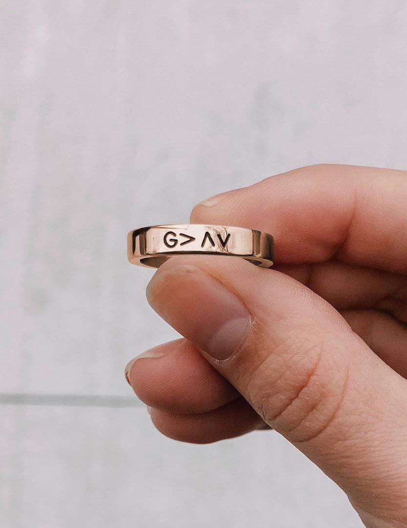 Elevated Faith Christian Jewelry Ring with engraved G>AV design in a stylish gold finish