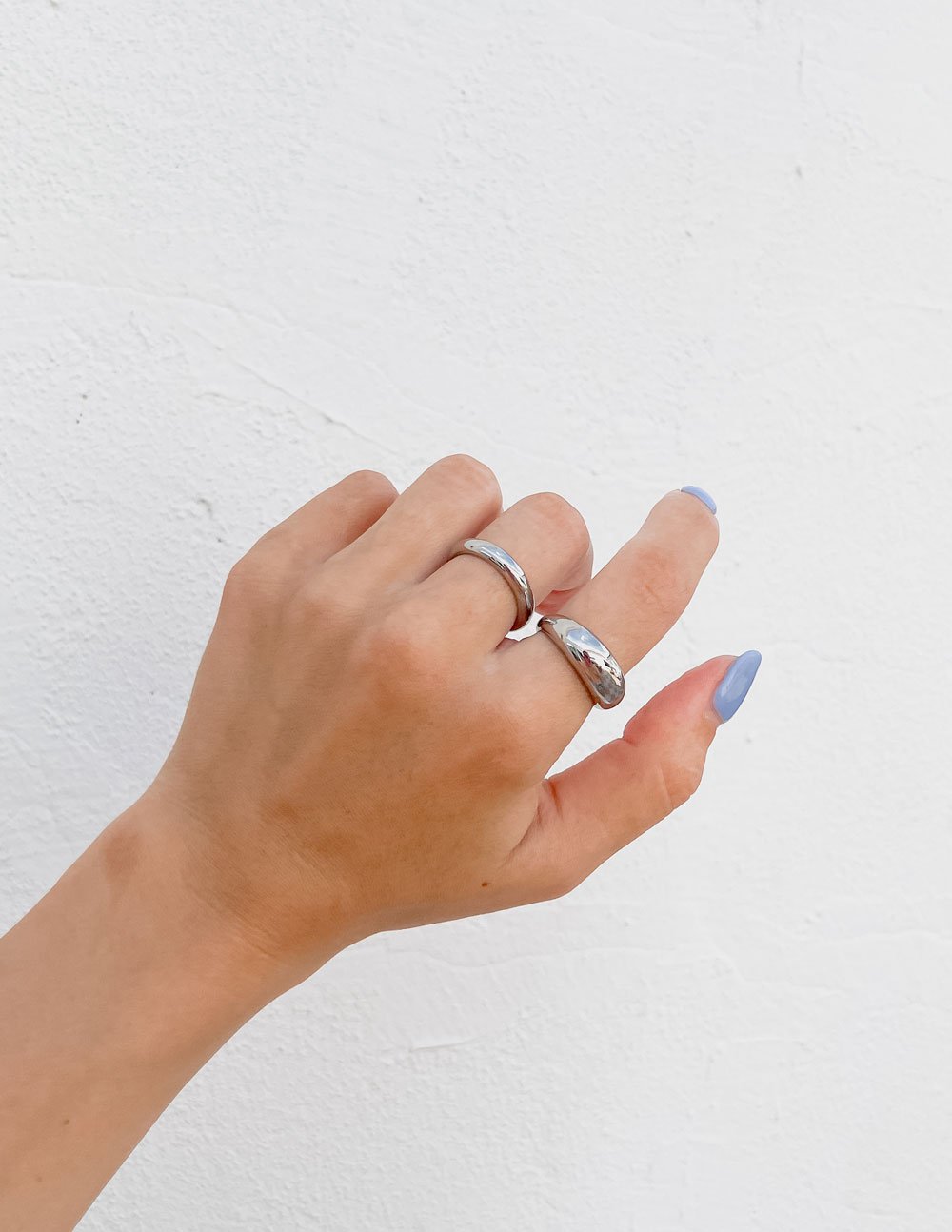 Elegant Elevated Faith Ring showcasing Christian Jewelry worn on a hand with manicured nails
