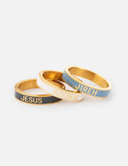 Set of three Elevated Faith Christian Jewelry rings featuring the words Jesus, Adonai, and Jireh