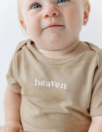 Tan onesie for infants with 'heaven' print, perfect for Christian Kids Apparel and everyday wear