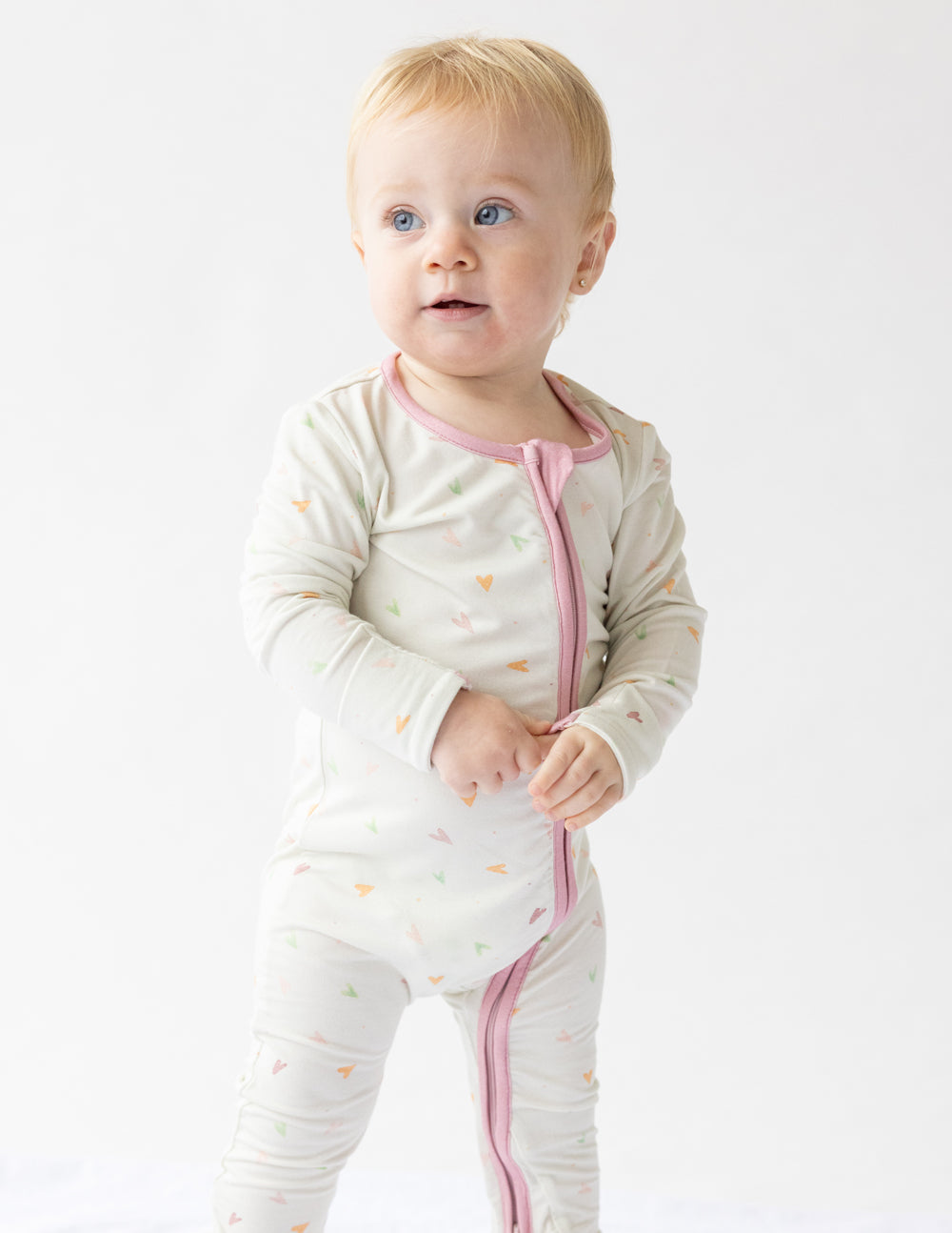 Comfortable onesie for children featuring a pastel triangle print, part of Christian Kids Apparel