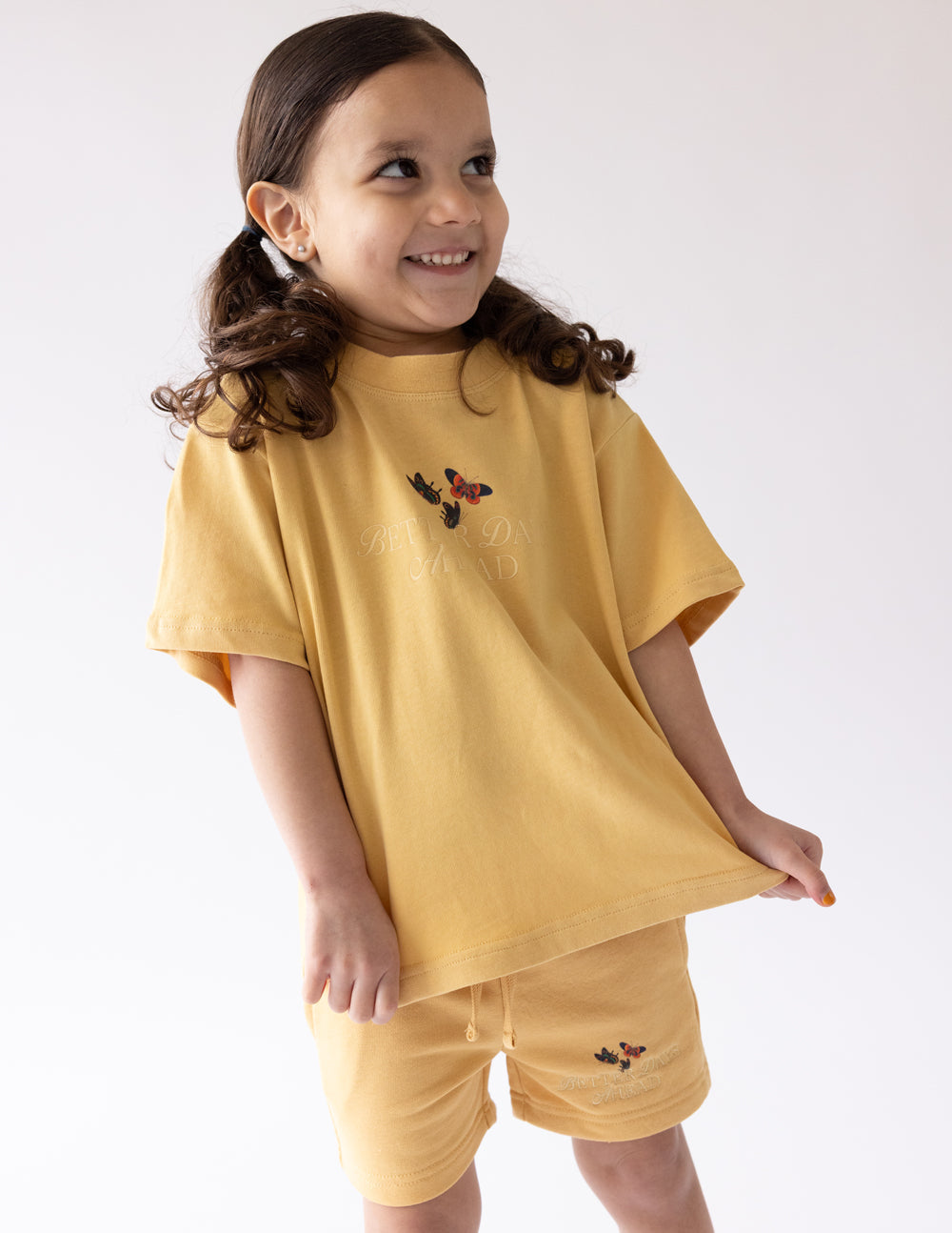 Elevated Faith Kids T-Shirt in yellow with butterfly design, perfect Christian Kids Apparel