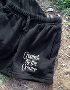 Black kids shorts by Elevated Faith with 'Created by the Creator' design, perfect Christian Kids Apparel