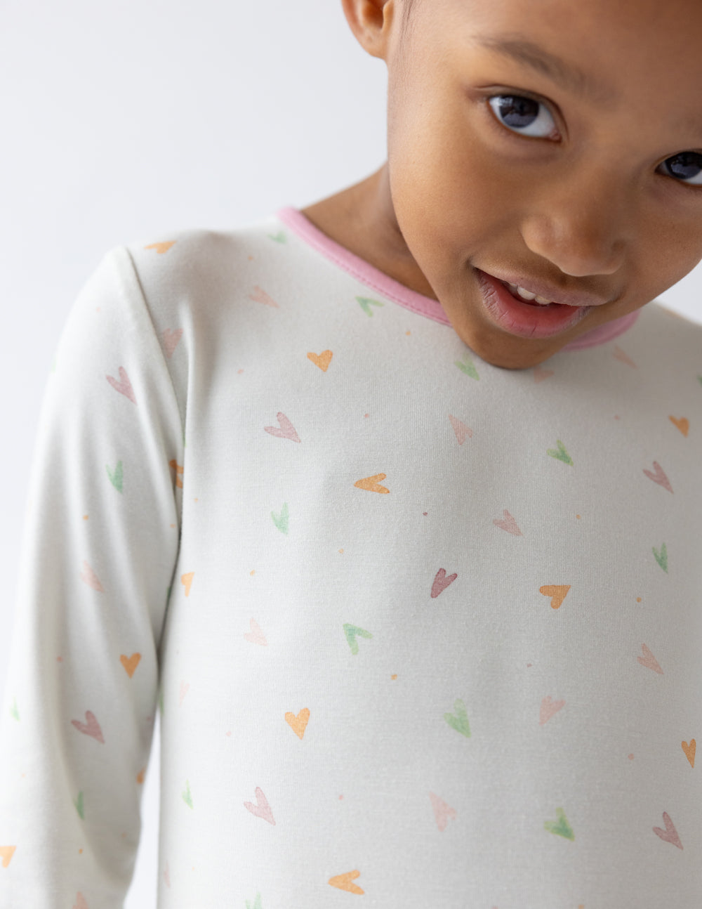 Comfortable kids pajama featuring a heart pattern, perfect for Christian Kids Apparel from Elevated Faith