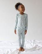 Cute girls pajamas from Elevated Faith featuring pastel clouds, perfect Christian Kids Apparel for cozy nights
