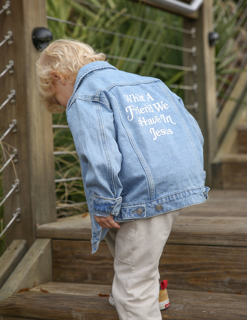 Denim Kids Jacket from Elevated Faith featuring Christian Kids Apparel design with text on the back