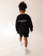 Black Elevated Faith Kids Crewneck Sweatshirt for Christian Kids Apparel with Back Logo Design
