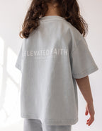 Elevated Faith Kids T-Shirt in Light Gray with Christian Kids Apparel design on the back