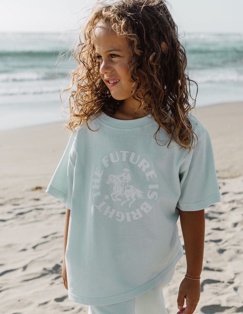 Pastel Kids T-Shirt from Elevated Faith featuring 'The Future is Bright' print, perfect Christian Kids Apparel