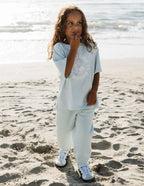 Light blue kids t-shirt from Elevated Faith featuring a fun design, perfect Christian Kids Apparel for beach outings