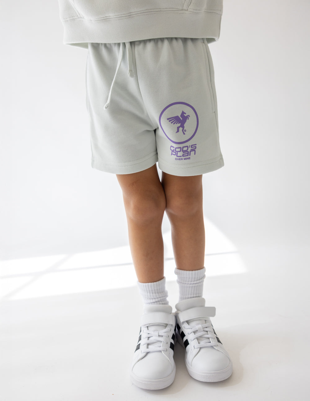 Light green shorts for kids with graphic design from Elevated Faith, perfect Christian Kids Apparel