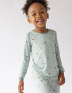 Cute kids pajama set in mint green featuring animal prints, part of Christian Kids Apparel collection