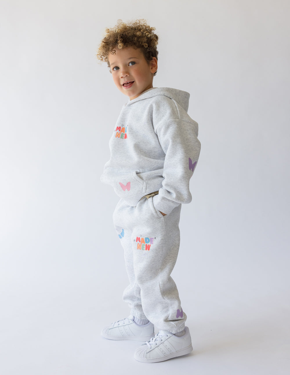 Gray Kids Hoodie from Elevated Faith featuring colorful butterfly designs, perfect Christian Kids Apparel