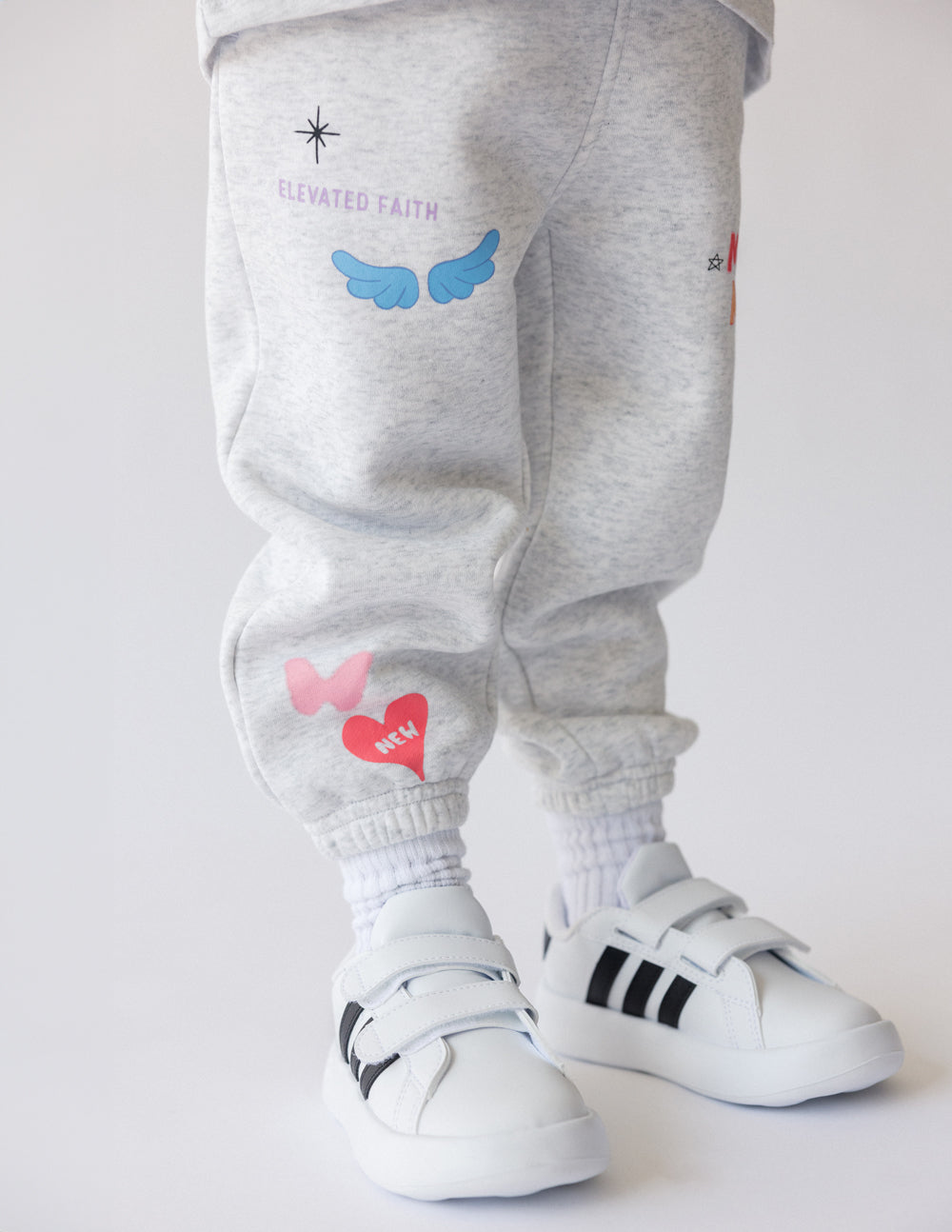 Gray Kids Sweatpant by Elevated Faith with colorful graphics, part of Christian Kids Apparel