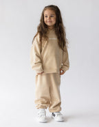 Elevated Faith Kids Hoodie in Beige with Front Pocket, part of Christian Kids Apparel collection