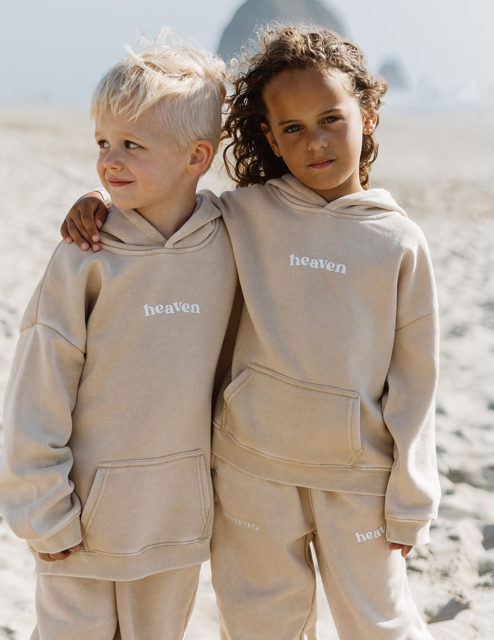 Elevated Faith beige kids hoodie featuring 'heaven' text for Christian Kids Apparel