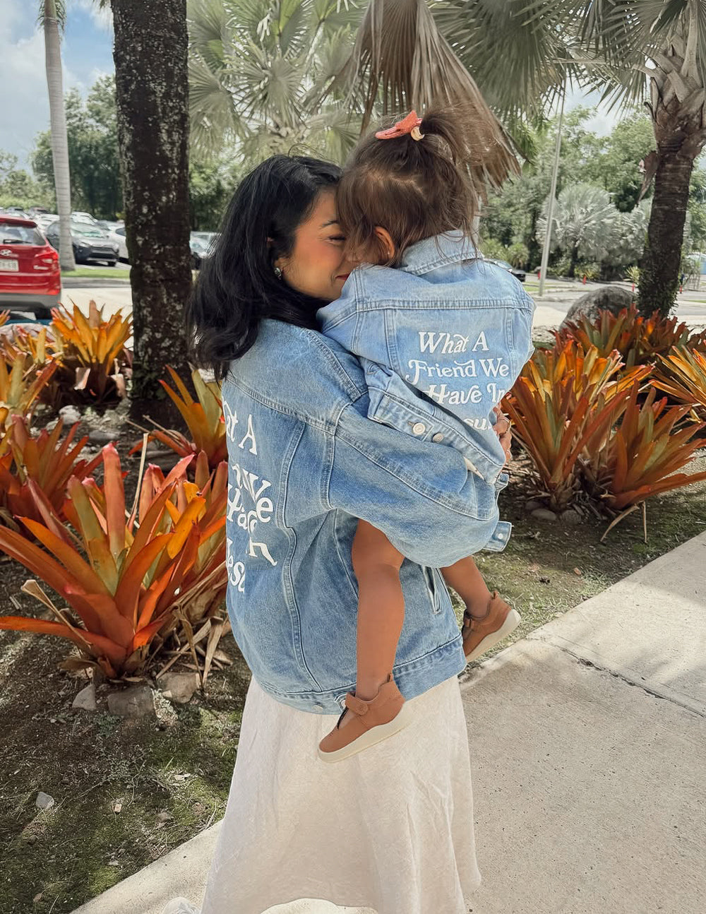 Mom and daughter wearing matching denim jackets from Elevated Faith, perfect Christian Kids Apparel