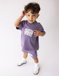 Purple Elevated Faith Kids T-Shirt with 'Prayer Works' design, part of Christian Kids Apparel