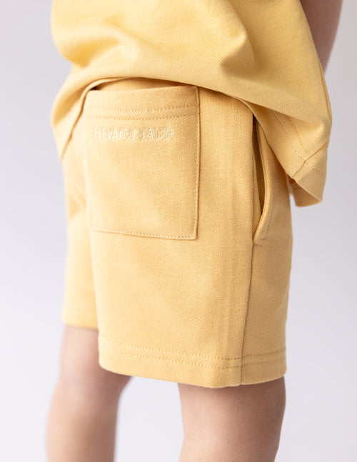 Elevated Faith Kids Shorts in Yellow with Back Pocket for Christian Kids Apparel