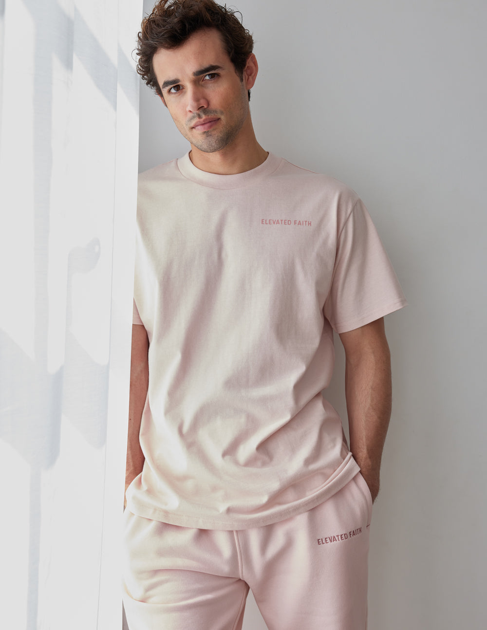 Elevated Faith Christian Apparel T-Shirt in soft pink, perfect for casual wear and expressing faith